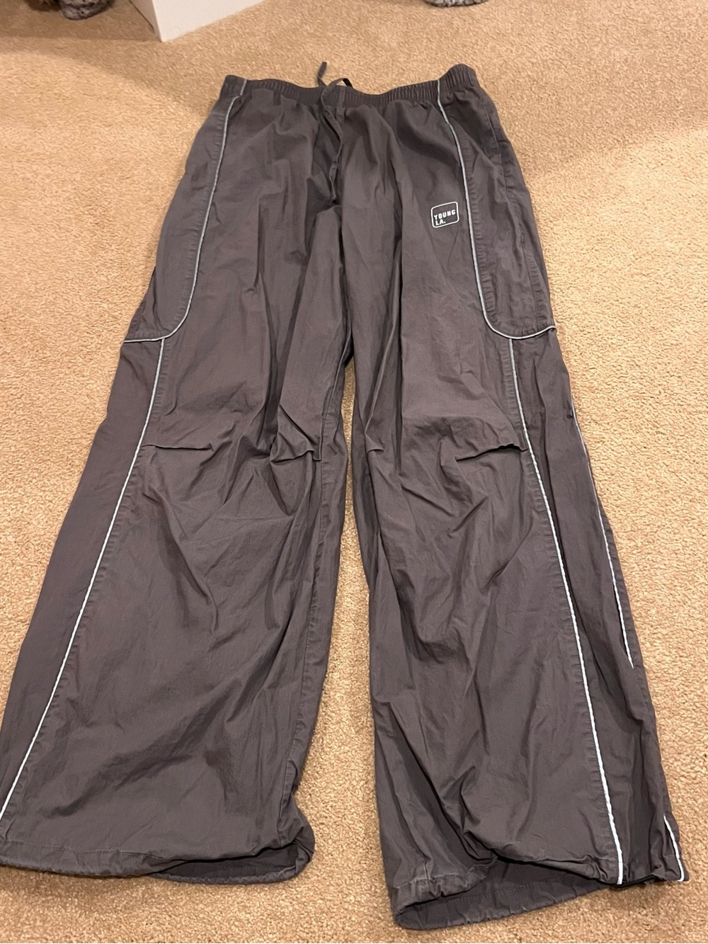 Youngla for her track pants